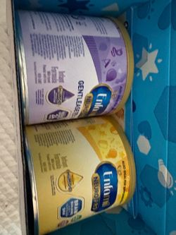 Enfamil cans of baby formula
