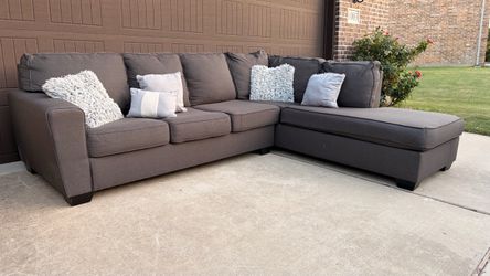 Beautiful Dark Gray Sectional. Very good condition! Clean, Comfortable and Sturdy!