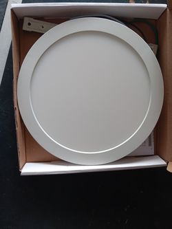 Round surface mount LED light.