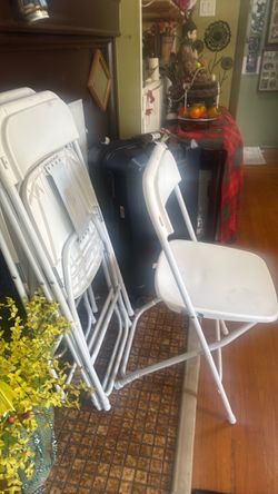 4  new plastic medal folding chairs