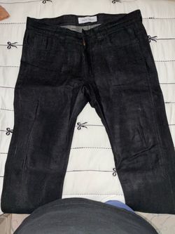 Oskar Capaul “waxed stacked jeans”