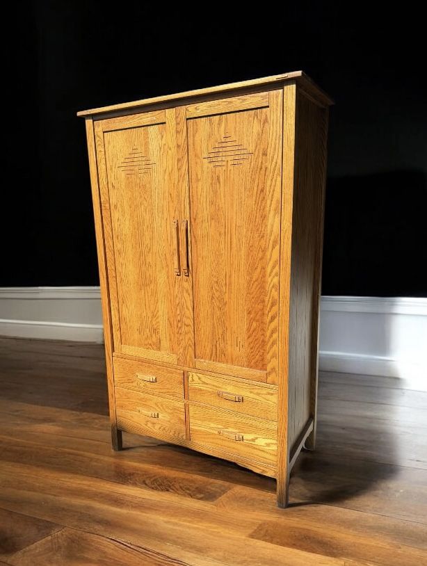 Traditional solid oak clothes wardrobe armoire w/4 drawers. 22 deep by 40 1/2 L by 72H.