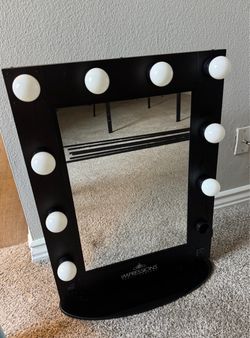 IMPRESSIONS VANITY