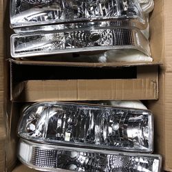 98-04 Chevy blazer / S10 CHROME HOUSING AND CLEAR HEADLIGHTS Open Box 
