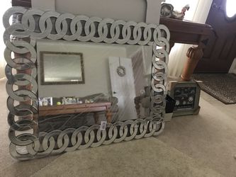 Chain link mirror