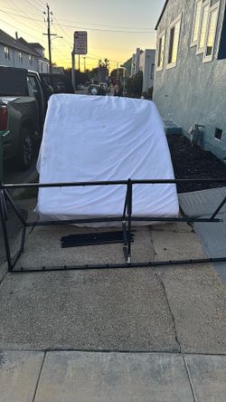 Brand new queen, size mattress, and frame free come get it