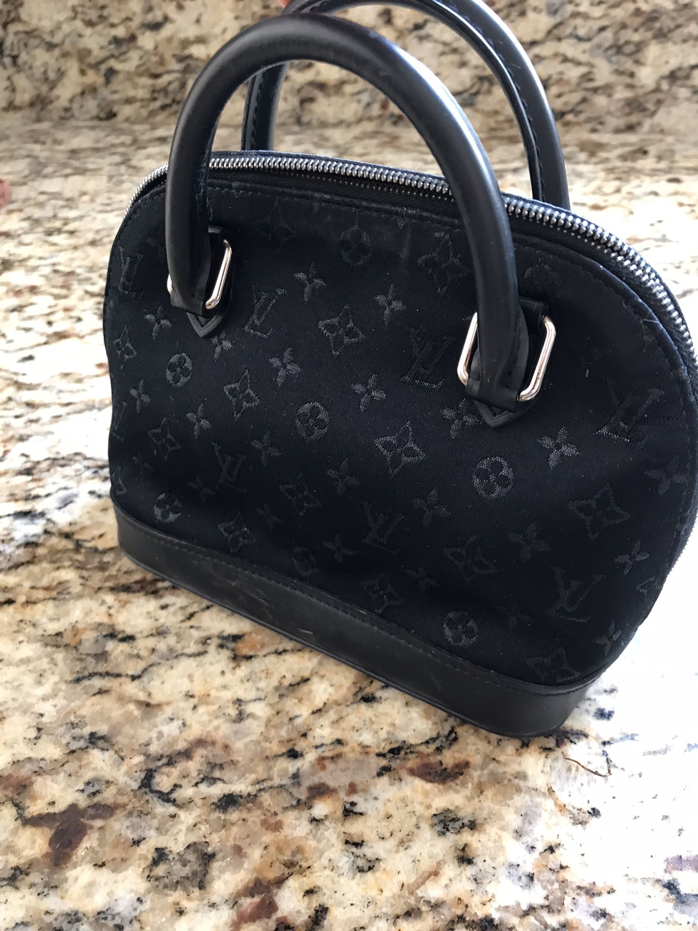 Louis Vuitton Mini Alma Handbag
