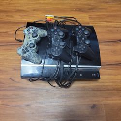 PS3 w/controllers and Games