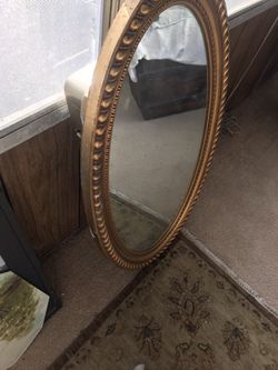 Oval mirror/ medicine cabinet. Great condition. Opens so the mirror can give you different angles.