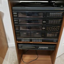 Stereo, Cassette Player, Amiplier, Cd Player, Turn Table and Two Speakers 