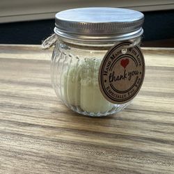 Heart shaped soap in a plastic jar. 