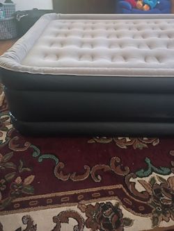 Air mattress full size with blow up pump built-in