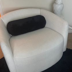 Two oversize swivel sheer chairs