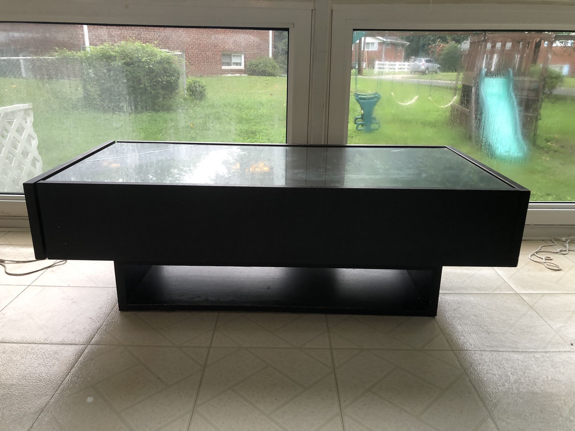 Coffee table with side drawers