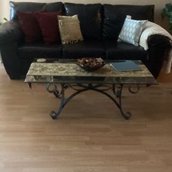 Rod Iron With Belveled Glass Coffee Table.