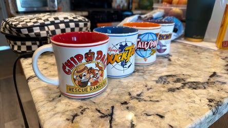 90s cartoon Mugs