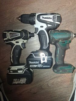 2 makita impact drills and one drill driver