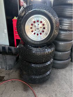 15” ion alloy chrome wheels with falken A/T tires for $800