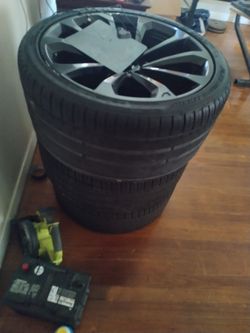 Black Multi-Spoke Alloy Wheel with Tire