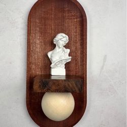 Wooden Wall Decor with Bust Sculpture and Ball