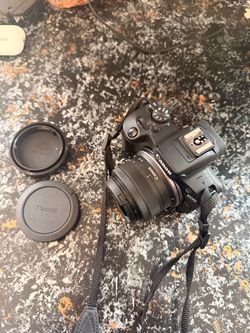 Canon EOS R100 Mirrorless Camera w/ RF-S 18-45mm Lens + Battery