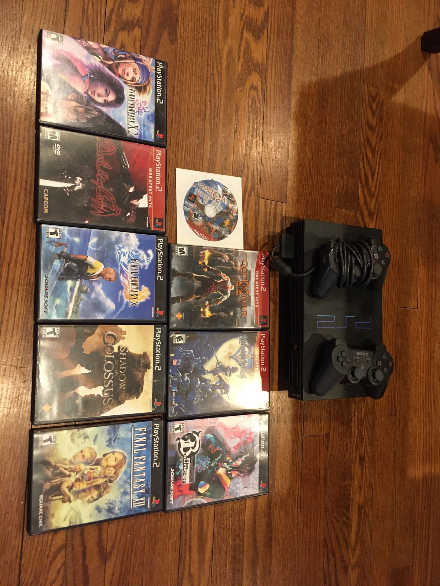 PS2 with 9 games and 1 controller