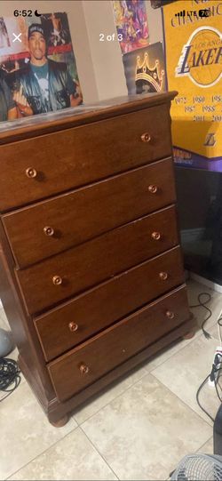 Tall wood dresser