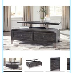 Ashley Taboe lift top coffee table. New in box