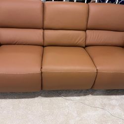 premium modern power-reclining 3-seater sofa in brand-new condition