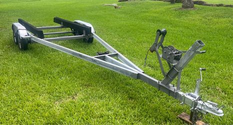 Galvanized dual axel trailer up to 25’ boat or 7,000lb. All components are in working order. Ready to load…