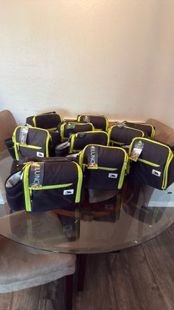 Arctic Zone insulated lunch bag features vibrant lime green accents and a structured top handle