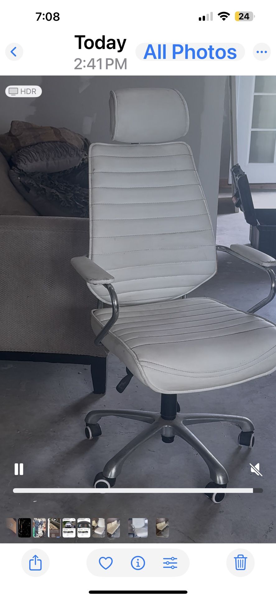 White office chair, with wheels and it spins