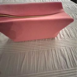 Lancome Paris Pink cloth cosmetic bag.