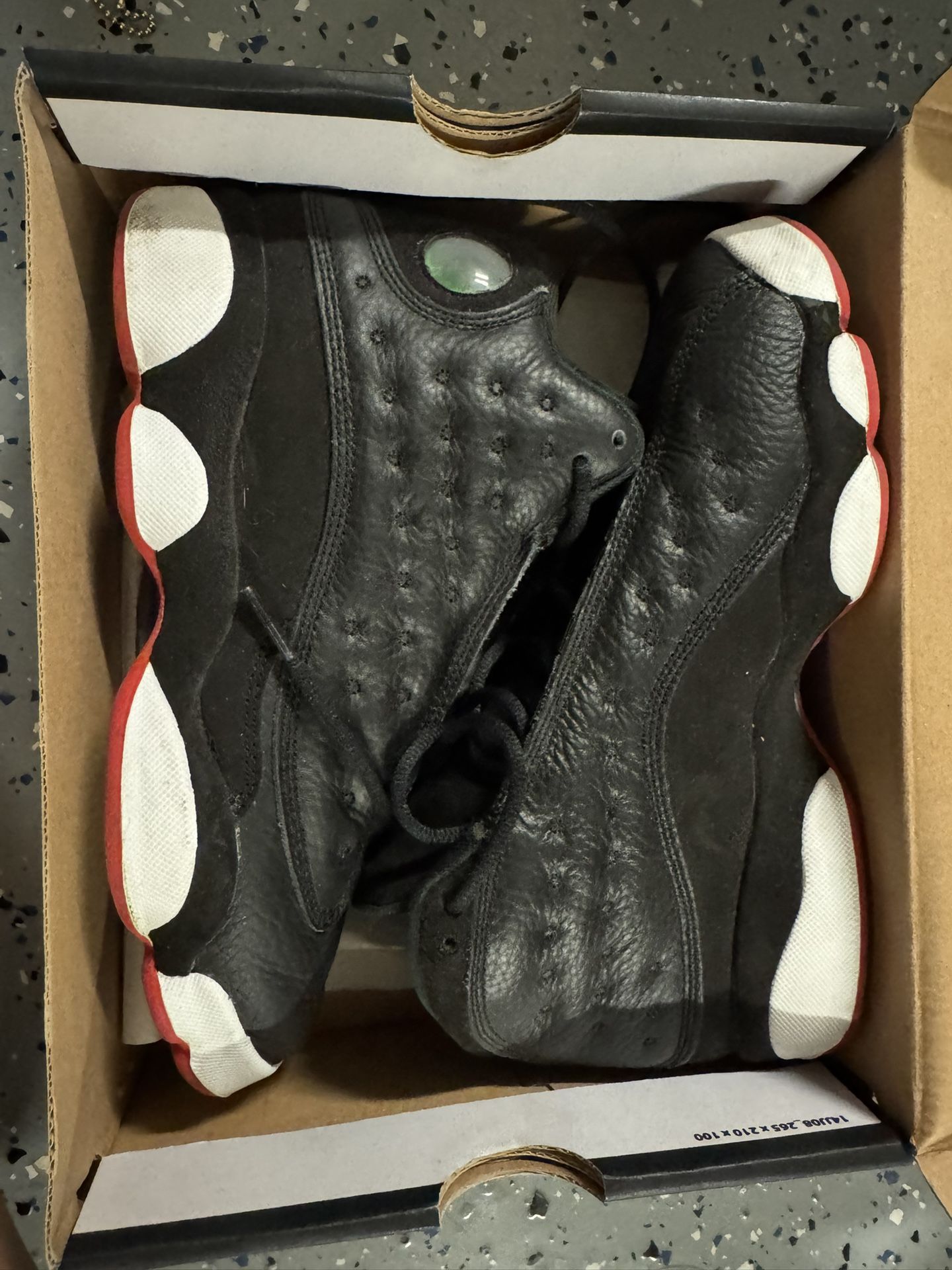 Air Jordan 13 Retro "Playoff" sneakers.