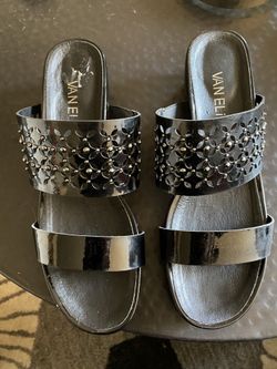 New Size 7 black Patent Vaneli wedges.