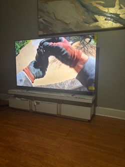 Flat screen 80 inch tv with stand and picture frame