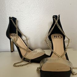 JLO black heels with gold chain