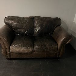 Leather love seat