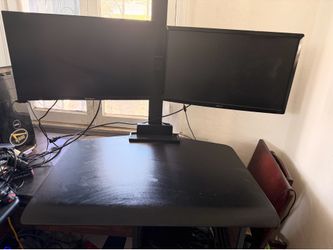 Standing desk converter with monitor stand