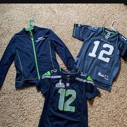 2 Official Jerseys And Seahawks Coat.  