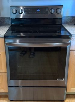 LG LREL6325D 6.3 cu. ft. Black Stainless Steel Electric Range with Air Fryer