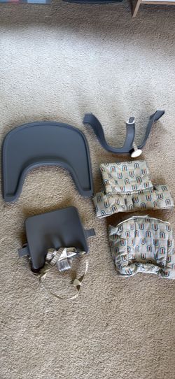Stokke high chair tray and baby set and cushion