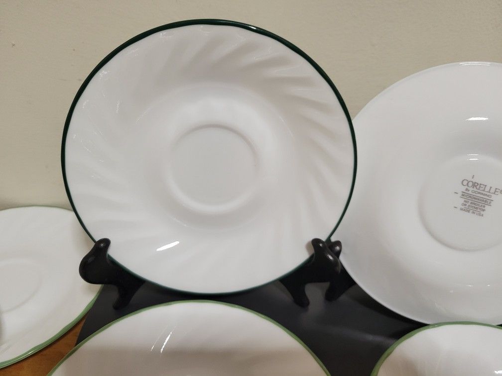 Vintage Corelle (Saucers )Swirl Green Rim 14 Saucers. All In Perfect Condition.
$1. EACH See pictures