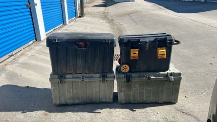 Four heavy duty plastic trunks