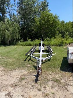 Shorlande Pontoon trailer for parts or repair.  Front beam has rotting.