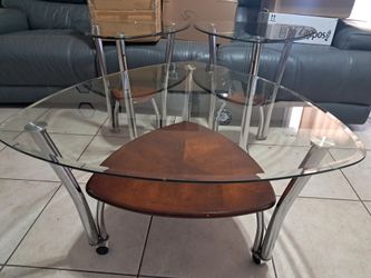 Triangular glass coffee and side tables