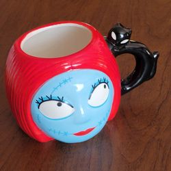 Tim Burton's Disney The Nightmare Before Christmas Sally head molded 
ceramic mug. Perfect shape, no chips or cracks. The mug features a 
sculpted des