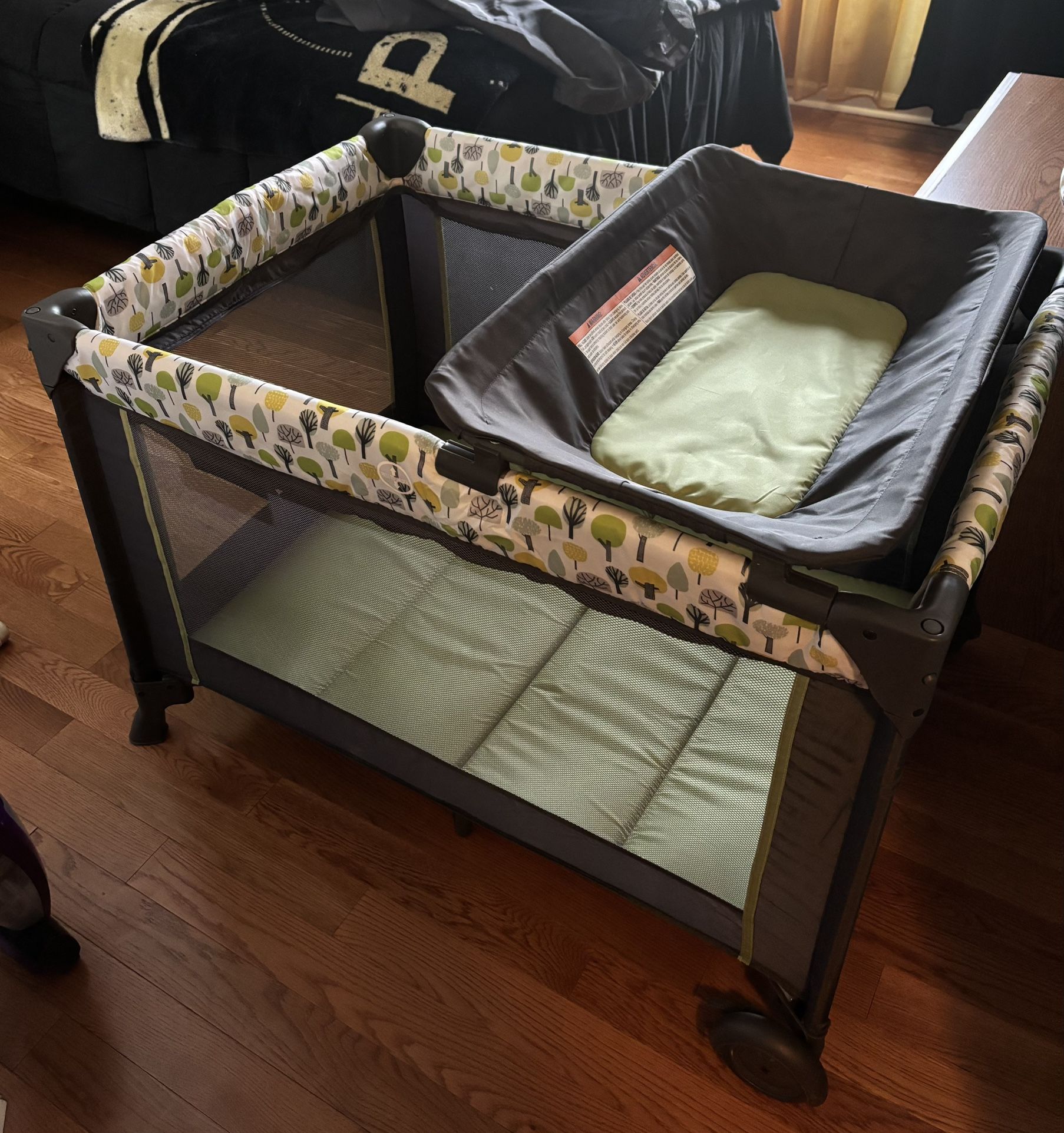 Portable Playpen With Bassinet Feature