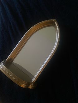Gold arched wall mirror
