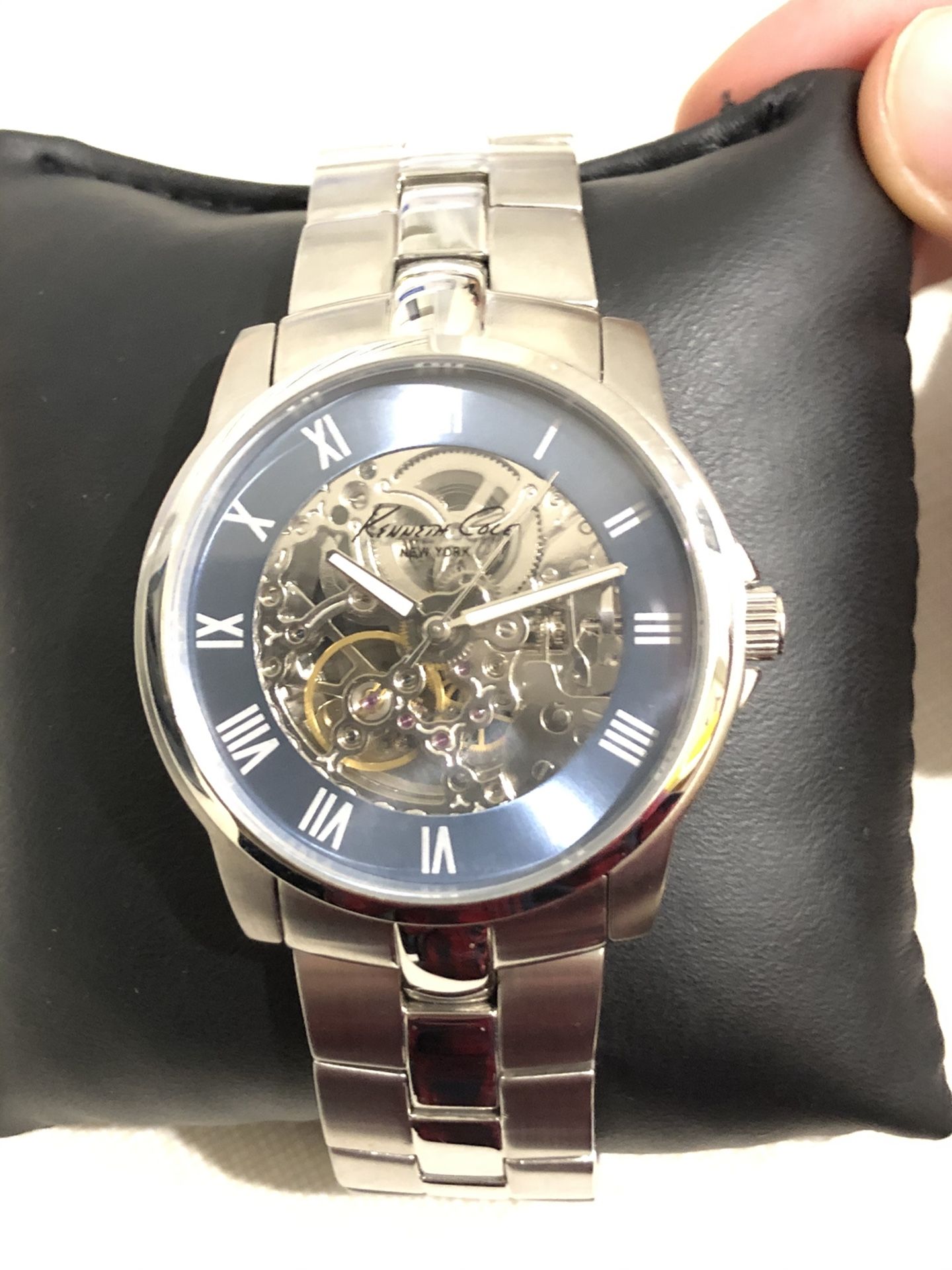 $185- Kenneth Cole Men’s Automatic Skeleton watch